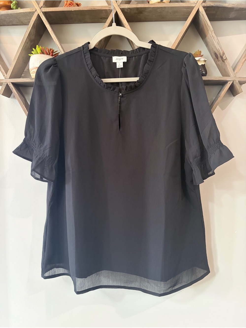 NWT J. Crew Factory black short-sleeve ruffleneck top. Size large.